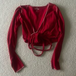 Hollister size medium wrap top; versatile ways to style by tying